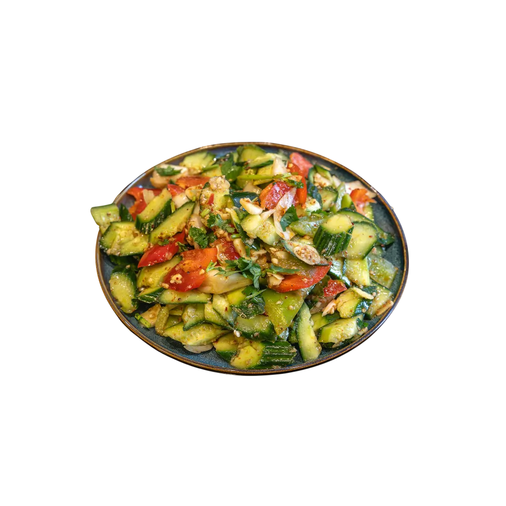 Crunchy cucumber and bell pepper salad with herbs and garlic on a blue plate 
